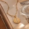 Light luxury vertical diamond lotus pattern pendant, snake bone chain, stainless steel collarbone chain, simple and niche high-end basic style, layered with gold jewelry Application Scenario